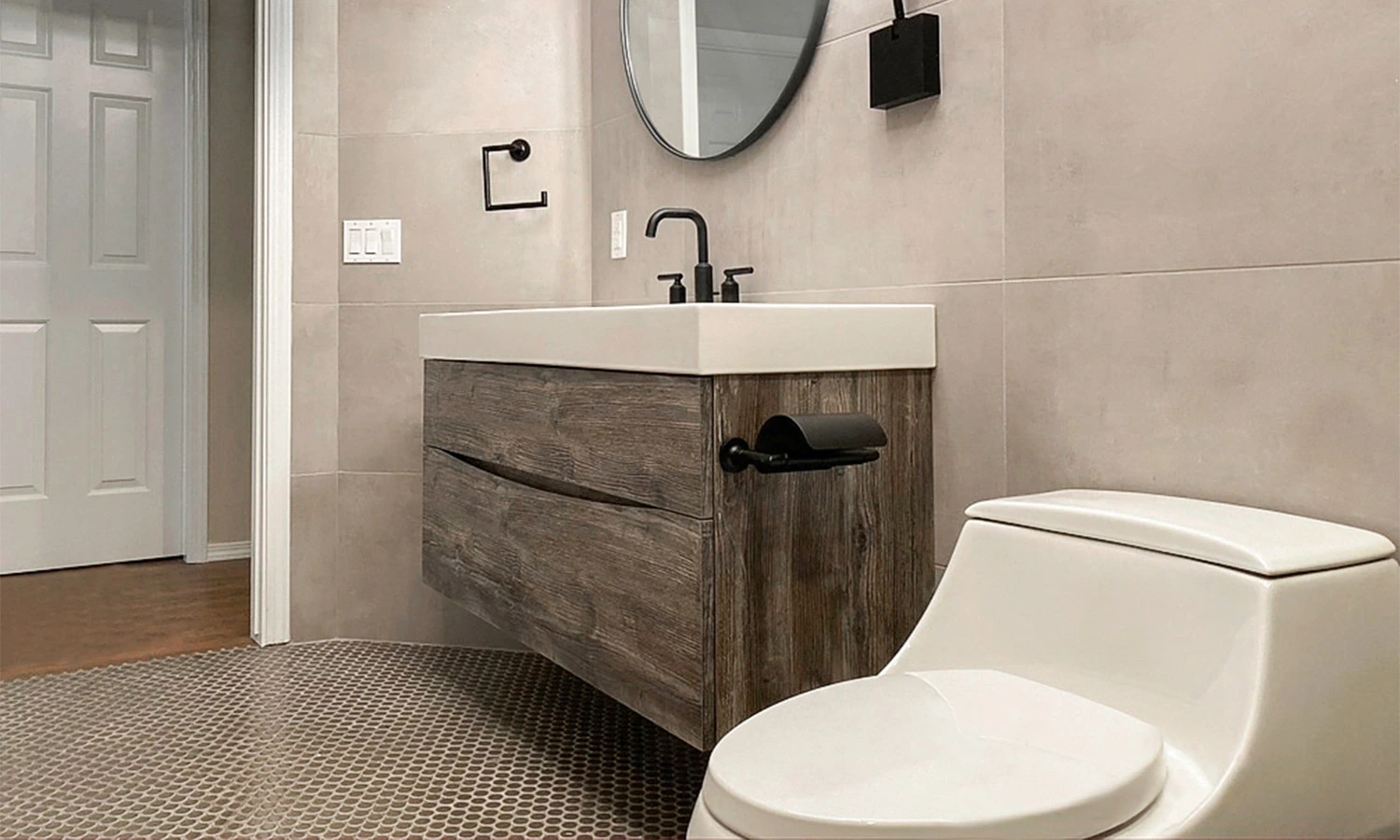 Contemporary bathroom design featuring sleek tiles, elegant vanity, and modern fixtures for a stylish look.