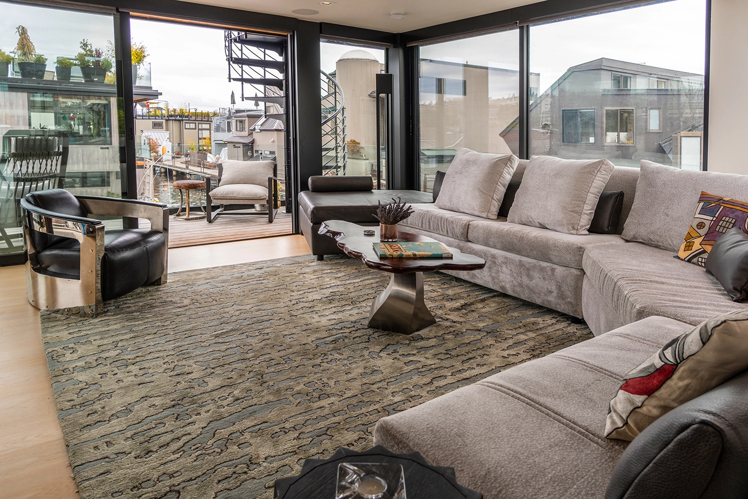 Stylish modern living space panoramic views natural light — Ariana Designs, Seattle floating home