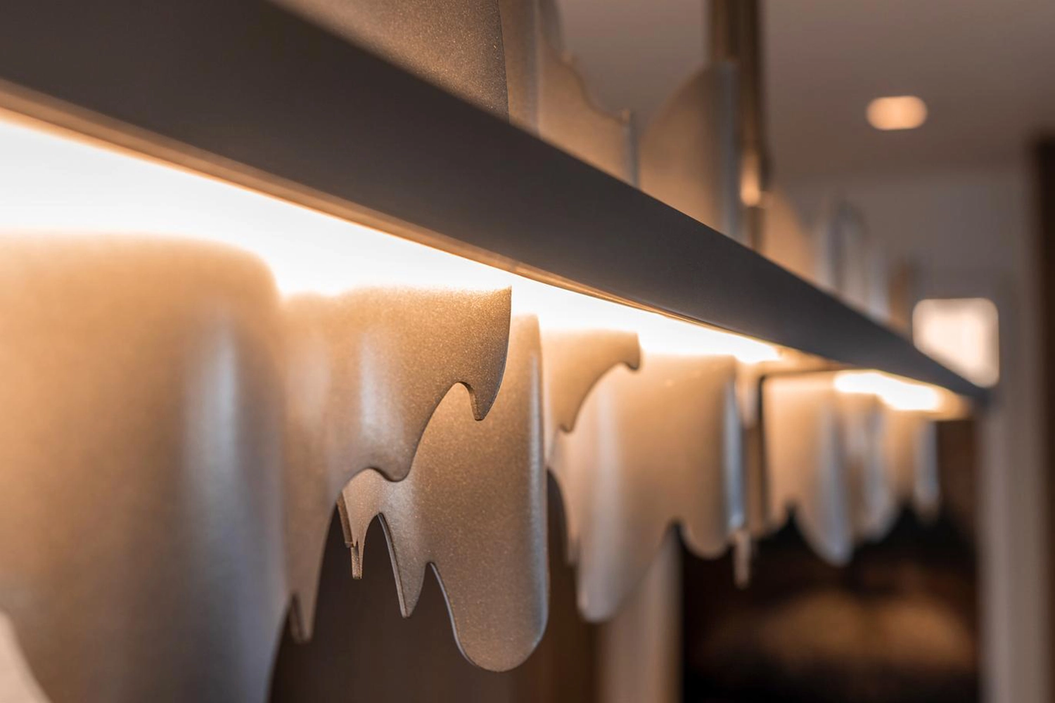 Unique wave lighting fixture modern interior warm illumination — Ariana Designs, Seattle floating home