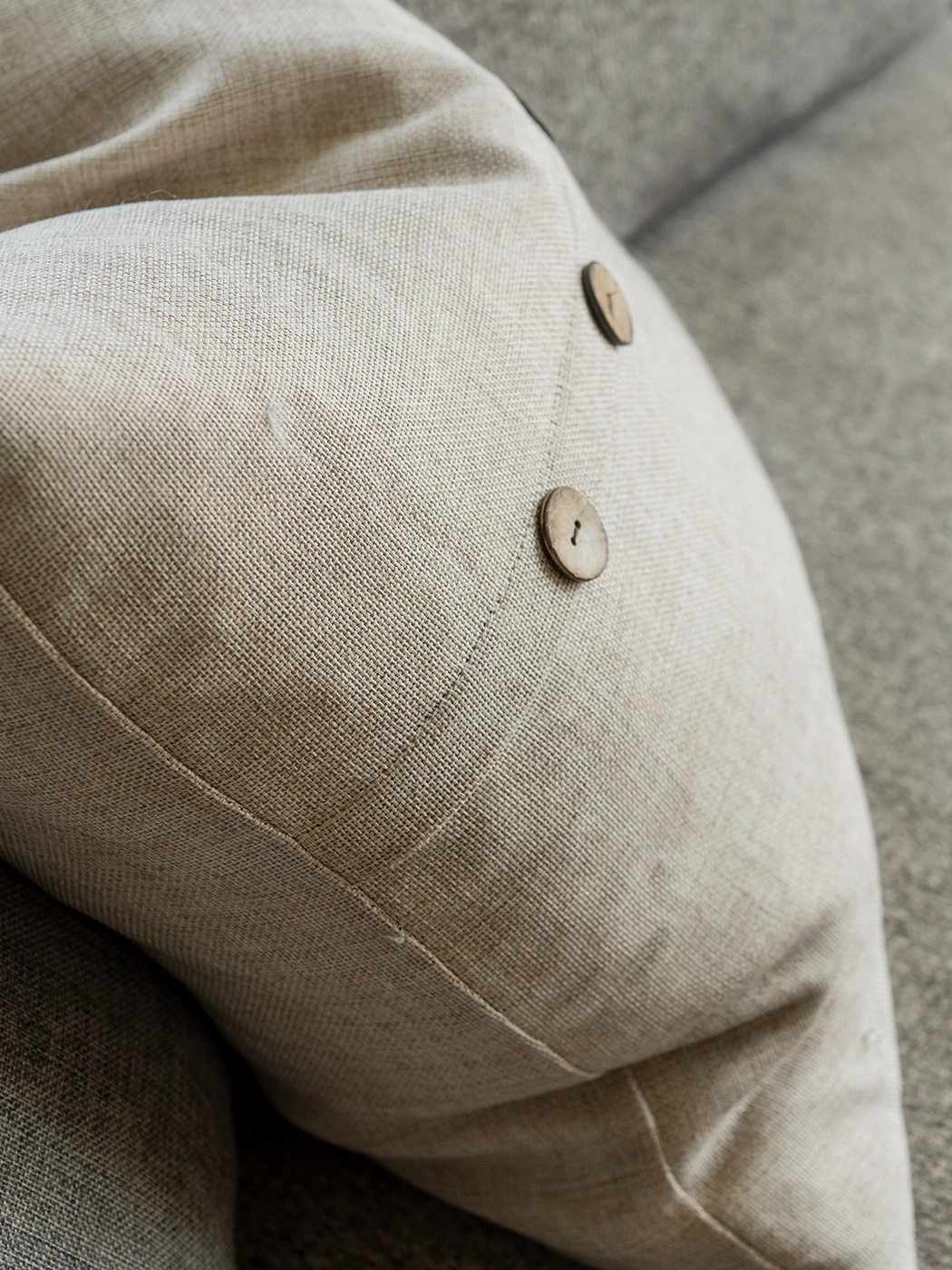 Beige cushion with layered textures