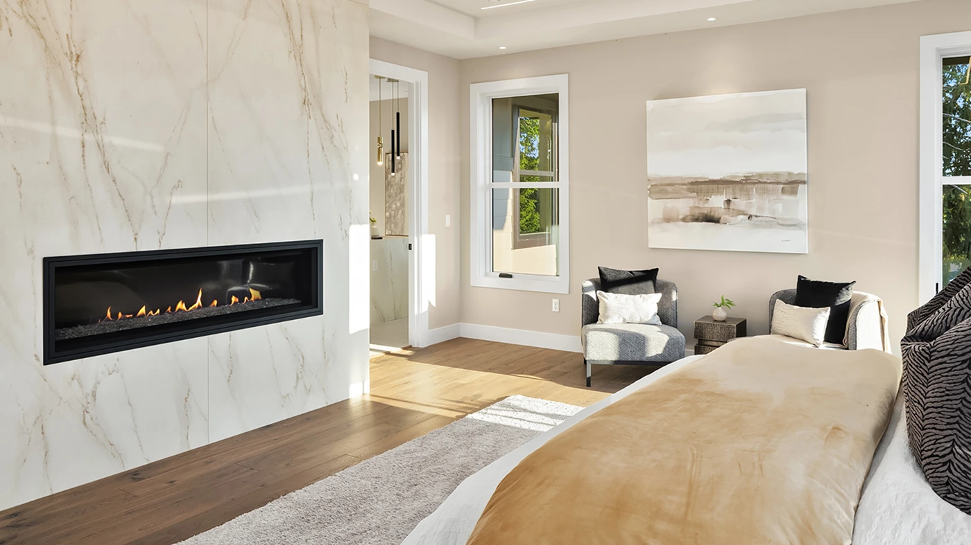 Elegant bedroom design with upholstered headboard — Medina Master Suite, Ariana Designs