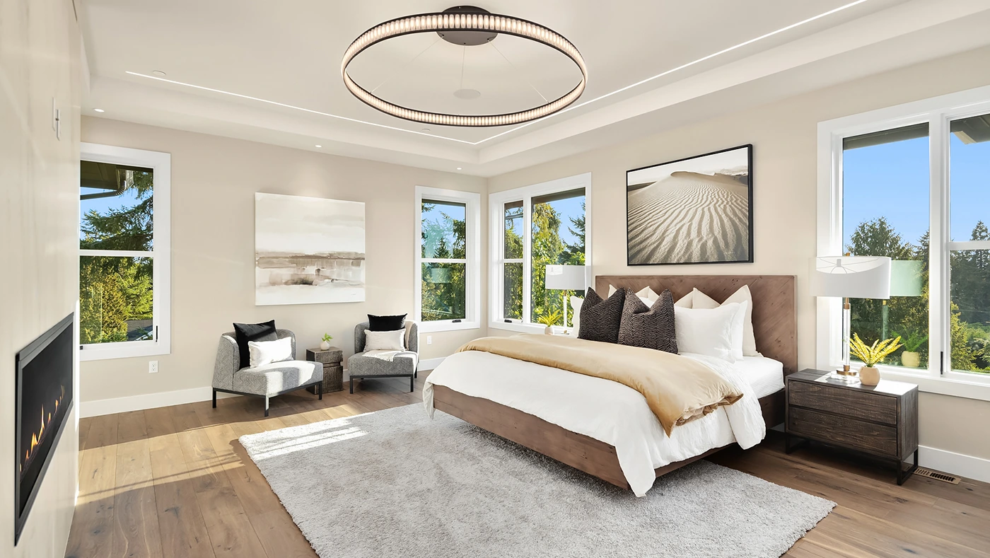 Modern bedroom design with layered bedding — Medina Master Suite, Ariana Designs