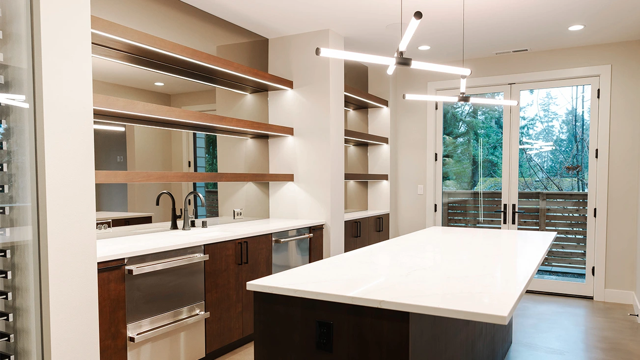 Modern kitchen with spacious island and wood shelves