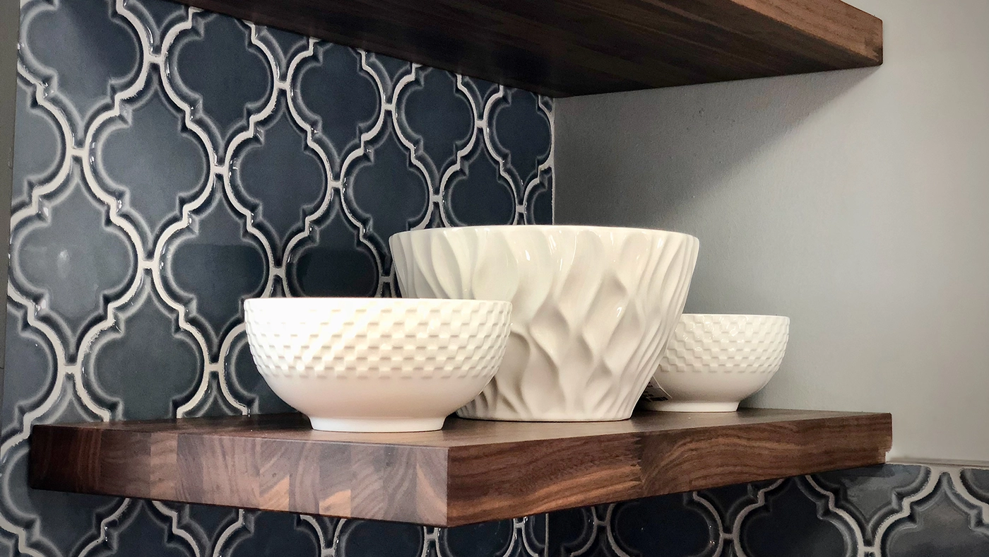 Open wood shelving with ceramic bowls — Cottage Kitchen, Ariana Designs