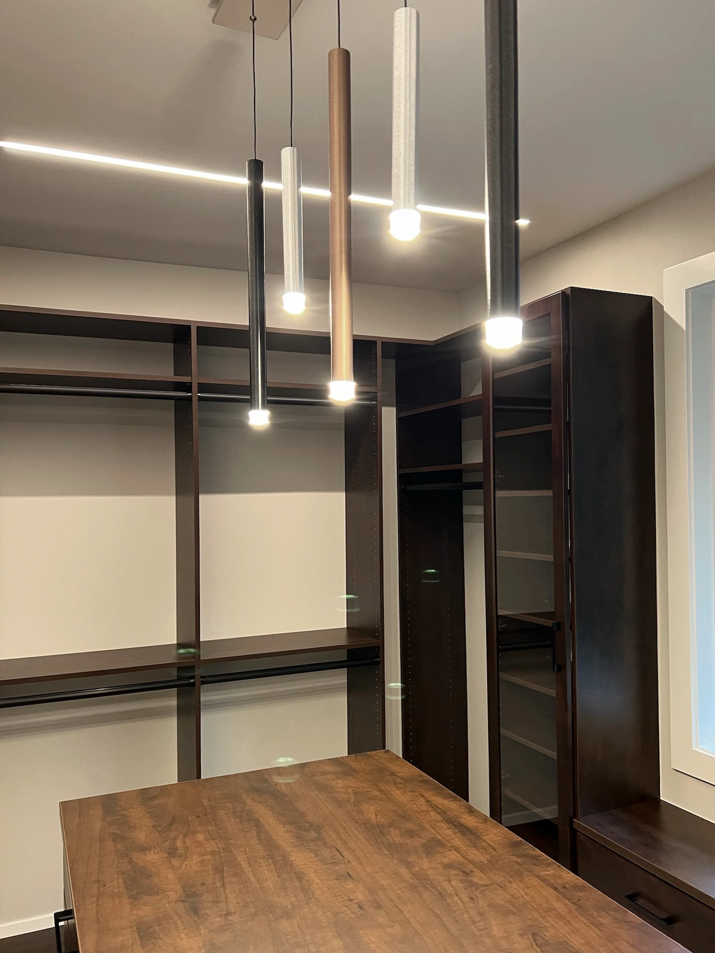 Walk-in closet with center island — Master Bedroom Medina, Ariana Designs