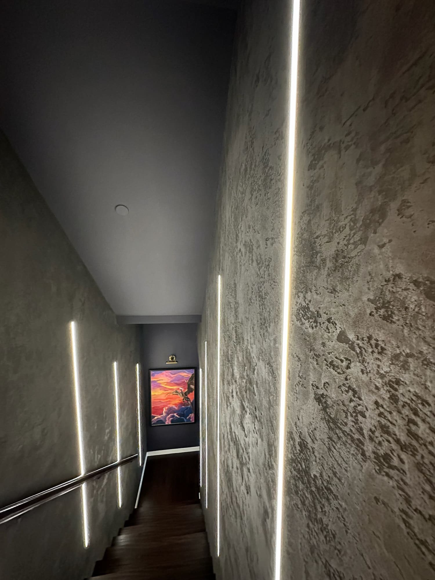 Modern staircase design with custom paneling — Ariana Designs