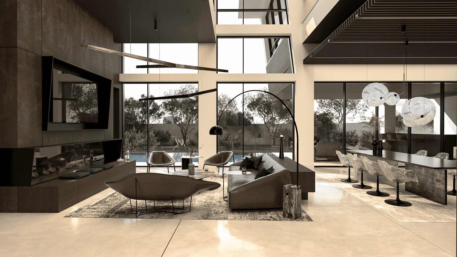 Open-plan great room with a contemporary fireplace lounge on one side and a stone kitchen island and dining area on the other, framed by expansive glazing.
